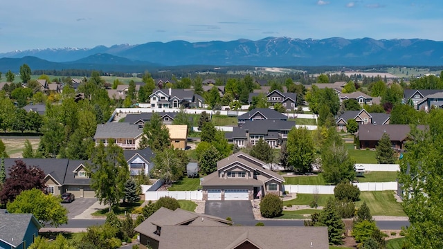 25 Logan Way, Kalispell, MT 59901 - aerial view of residential area with a mountain backdrop