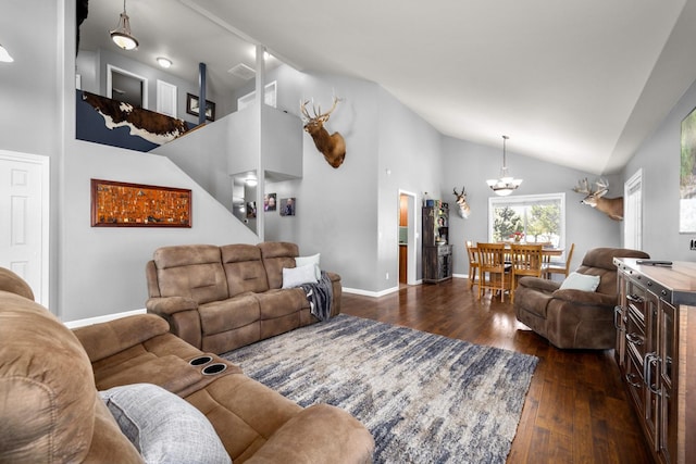 25 Logan Way, Kalispell, MT 59901 - living area with a chandelier, dark wood-style flooring, and high vaulted ceiling