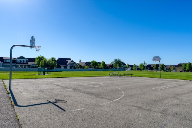 140 Ali Loop, Kalispell, MT 59901 - view of basketball court with community basketball court, a residential view, and a yard
