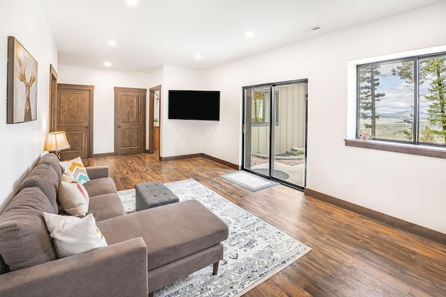 77 Rumsey Rd, Philipsburg, MT 59858 - living room featuring wood finished floors, baseboards, and recessed lighting