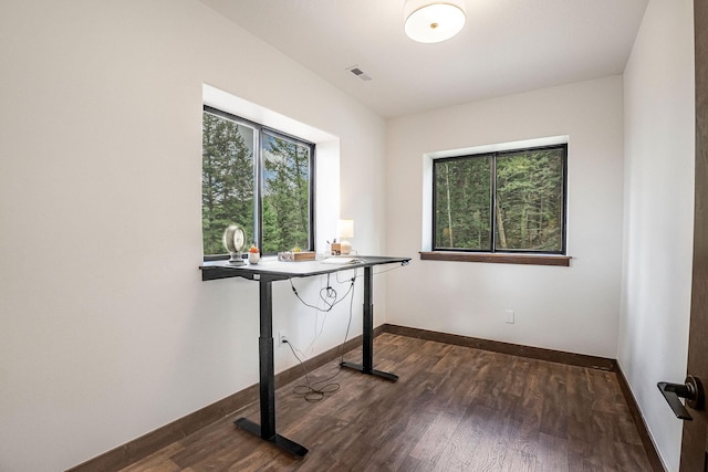 77 Rumsey Rd, Philipsburg, MT 59858 - unfurnished office with wood finished floors and baseboards
