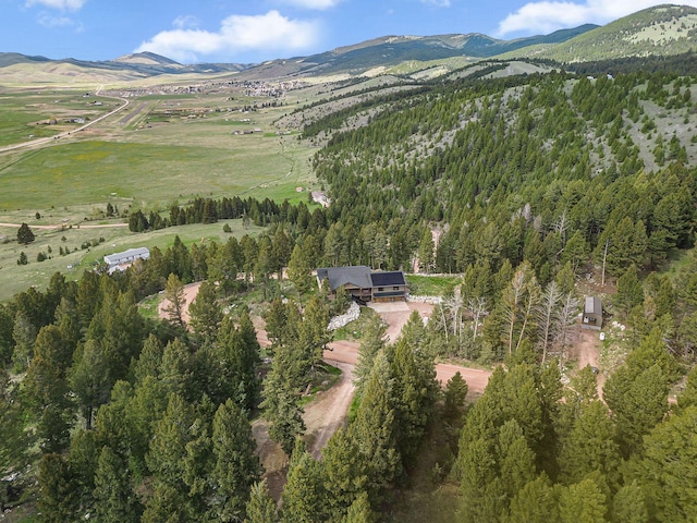 77 Rumsey Rd, Philipsburg, MT 59858 - aerial view of property and surrounding area with a mountain backdrop and a forest