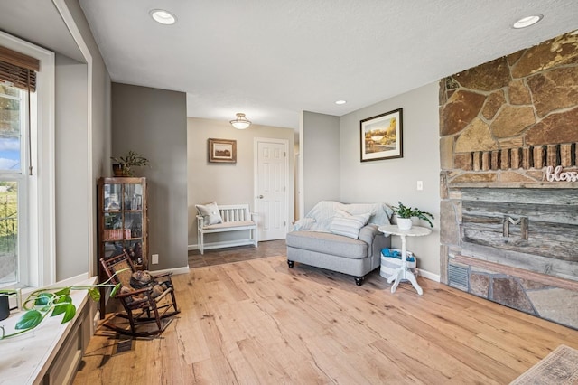 515 Manning Rd, Kalispell, MT 59901 - living area featuring healthy amount of natural light, wood finished floors, recessed lighting, and baseboards