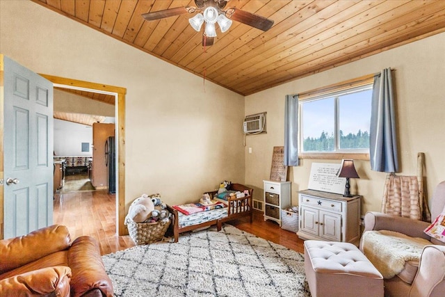 2571 Airport Rd, Eureka, MT 59917 - living area with wooden ceiling, vaulted ceiling, ceiling fan, wood finished floors, and a wall mounted AC