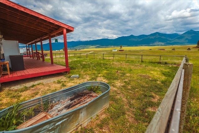 2571 Airport Rd, Eureka, MT 59917 - view of yard featuring a view of rural / pastoral area and a deck with mountain view