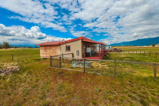 2571 Airport Rd, Eureka, MT 59917 - rear view of property with a view of rural / pastoral area and a mountain view