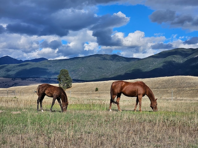 2571 Airport Rd, Eureka, MT 59917 - mountain view featuring rural landscape and agricultural land