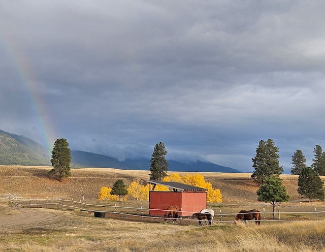2571 Airport Rd, Eureka, MT 59917 - view of yard featuring a view of rural / pastoral area and a mountain view