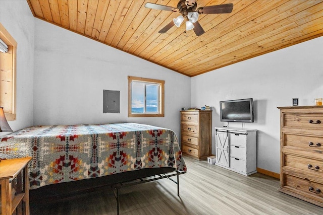 2571 Airport Rd, Eureka, MT 59917 - bedroom with vaulted ceiling, wood ceiling, and light wood-style flooring