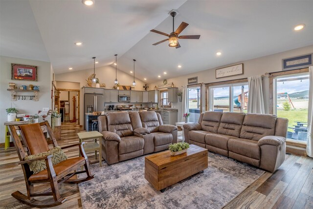 2320 Kenai Rd, Helena, MT 59602 - living room with ceiling fan, wood finished floors, vaulted ceiling, and recessed lighting