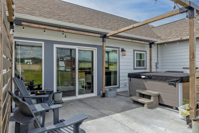 2320 Kenai Rd, Helena, MT 59602 - view of patio featuring a hot tub and a pergola