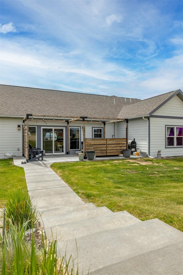 2320 Kenai Rd, Helena, MT 59602 - rear view of property with a patio area