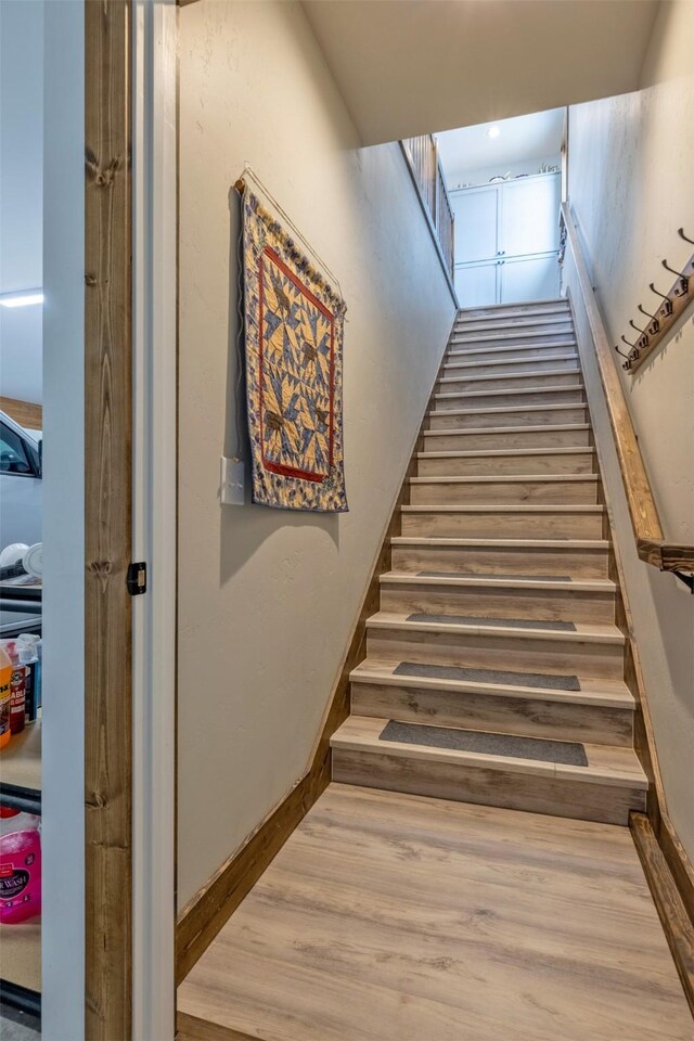 2320 Kenai Rd, Helena, MT 59602 - stairway with wood finished floors and baseboards