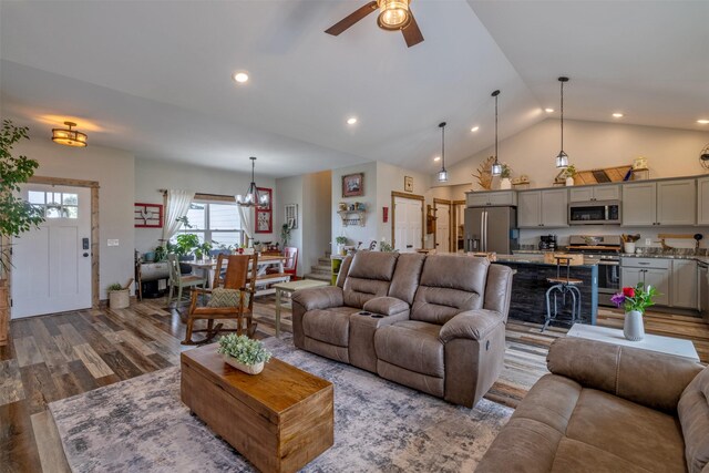 2320 Kenai Rd, Helena, MT 59602 - living area featuring wood finished floors, ceiling fan, a chandelier, recessed lighting, and high vaulted ceiling