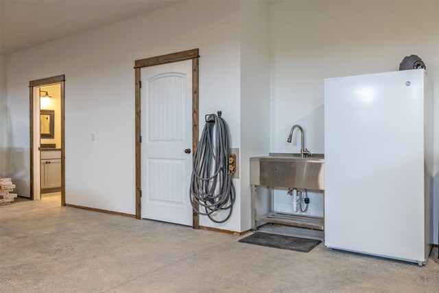 2320 Kenai Rd, Helena, MT 59602 - miscellaneous room with a sink, finished concrete flooring, and baseboards