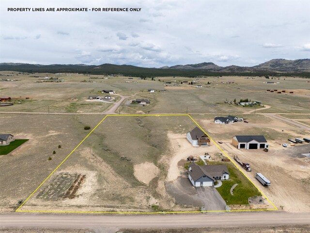 2320 Kenai Rd, Helena, MT 59602 - overview of rural landscape featuring property boundaries highlighted and a mountainous background