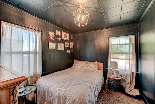 1202 Walnut St, Helena, MT 59601 - bedroom with multiple windows, carpet floors, and a chandelier