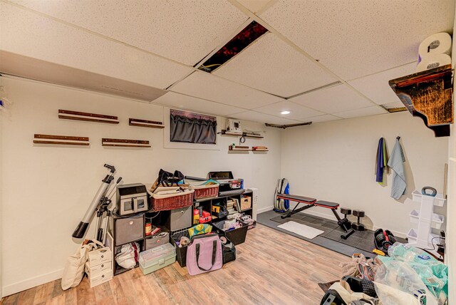 1202 Walnut St, Helena, MT 59601 - exercise room featuring a drop ceiling, baseboards, wood finished floors, and recessed lighting