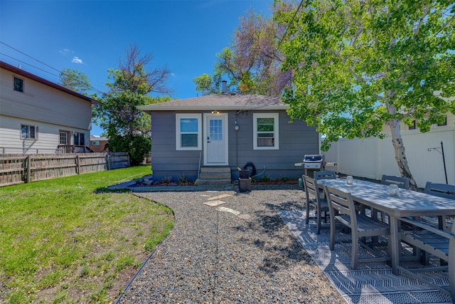 1202 Walnut St, Helena, MT 59601 - back of house featuring entry steps and outdoor dining area