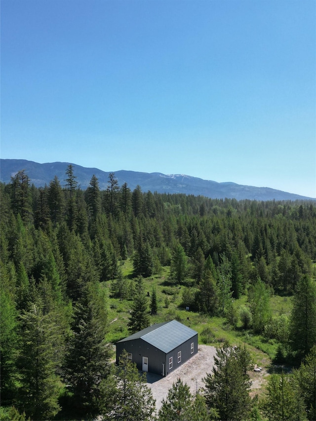 111 Lupfer Loop Rd, Olney, MT 59927 - view of mountain backdrop with a heavily wooded area
