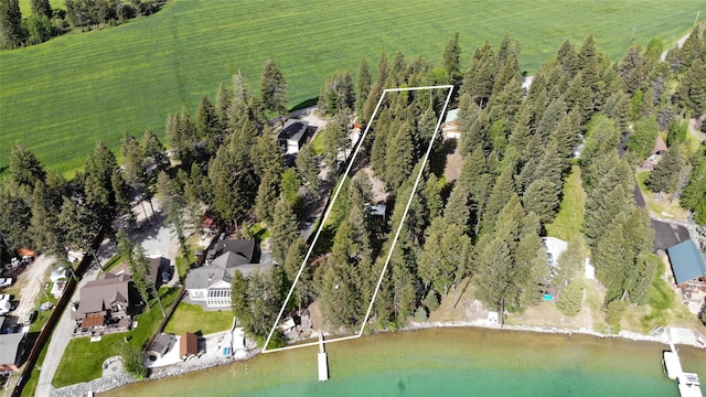 285 Metzner Dr, Trego, MT 59934 - aerial view of property and surrounding area with property boundaries highlighted and a large body of water