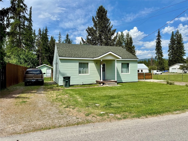 172 Garden Rd, Libby, MT 59923 - view of front facade featuring dirt driveway and a shingled roof