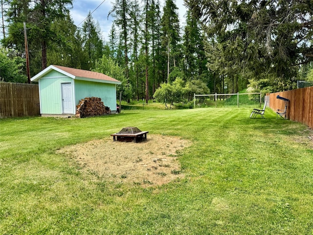 172 Garden Rd, Libby, MT 59923 - view of yard featuring an outdoor fire pit