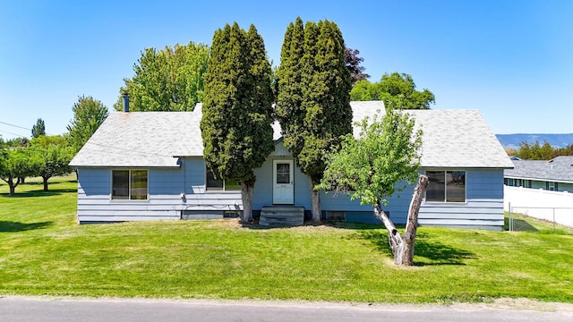 906 11th St E, Polson, MT 59860 - view of front of property featuring roof with shingles