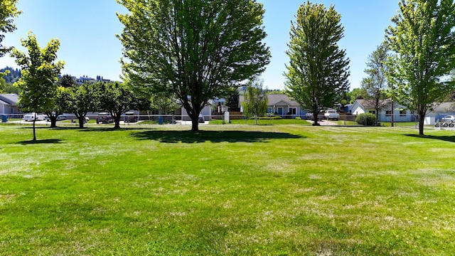906 11th St E, Polson, MT 59860 - view of yard featuring a residential view