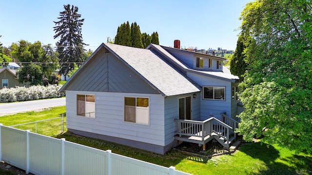 906 11th St E, Polson, MT 59860 - view of front of property with a chimney