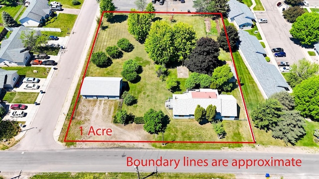 906 11th St E, Polson, MT 59860 - aerial perspective of suburban area featuring property boundaries highlighted