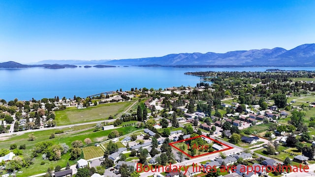 906 11th St E, Polson, MT 59860 - view of property location with a water and mountain view and property boundaries highlighted