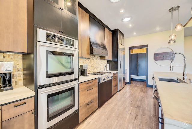 162 Jackson Creek Rd, Montana City, MT 59634 - kitchen with a sink, stainless steel appliances, backsplash, light countertops, and recessed lighting