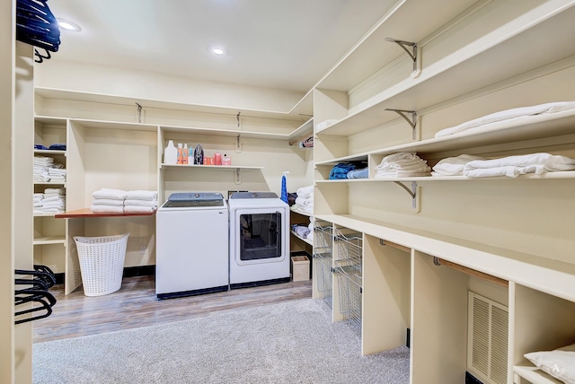 162 Jackson Creek Rd, Montana City, MT 59634 - washroom featuring washer and dryer, carpet flooring, and recessed lighting