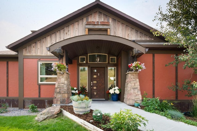 162 Jackson Creek Rd, Montana City, MT 59634 - doorway to property with board and batten siding