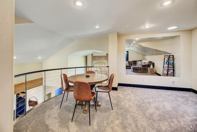 162 Jackson Creek Rd, Montana City, MT 59634 - carpeted dining space featuring vaulted ceiling, recessed lighting, arched walkways, and baseboards