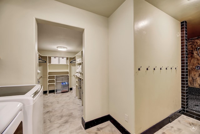 162 Jackson Creek Rd, Montana City, MT 59634 - laundry room with washing machine and clothes dryer and baseboards