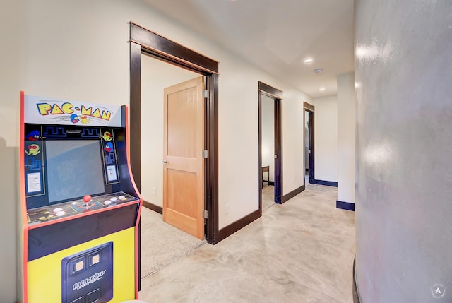 162 Jackson Creek Rd, Montana City, MT 59634 - corridor featuring baseboards, concrete floors, and recessed lighting