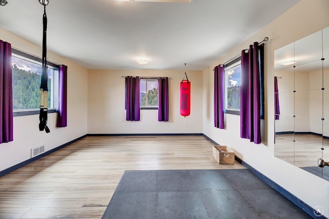 162 Jackson Creek Rd, Montana City, MT 59634 - spare room with wood finished floors and baseboards