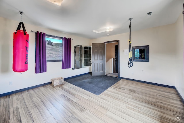 162 Jackson Creek Rd, Montana City, MT 59634 - spare room with baseboards and wood finished floors