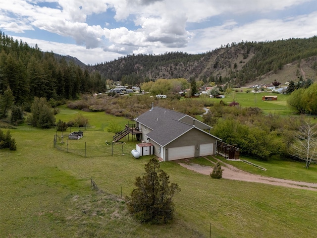 7551 York Rd, Helena, MT 59602 - view of rural area featuring mountains and a heavily wooded area
