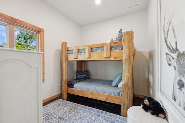 970 Colorado Ave, Whitefish, MT 59937 - bedroom with baseboards and wood finished floors