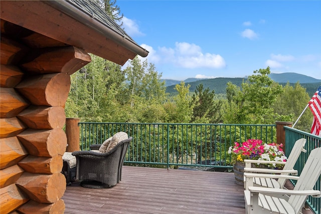 970 Colorado Ave, Whitefish, MT 59937 - deck featuring a mountain view and a view of trees