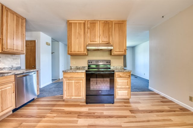 229 Glacier Dr, Lolo, MT 59847 - kitchen with stainless steel dishwasher, black range with electric stovetop, under cabinet range hood, light wood-style floors, and light brown cabinetry