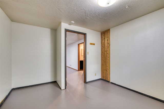 229 Glacier Dr, Lolo, MT 59847 - unfurnished room with concrete floors and baseboards