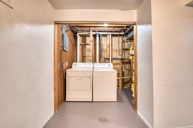 229 Glacier Dr, Lolo, MT 59847 - laundry area featuring washing machine and dryer and a textured wall