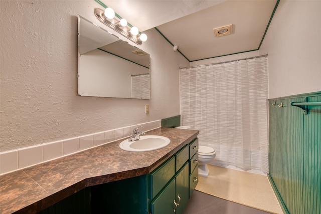 229 Glacier Dr, Lolo, MT 59847 - full bathroom featuring vanity and toilet