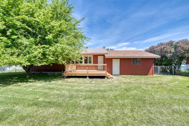 229 Glacier Dr, Lolo, MT 59847 - back of house with a wooden deck