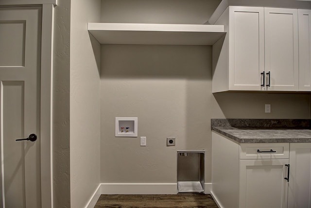 178 Meadow Vista Loop Unit A, Kalispell, MT 59901 - washroom featuring washer hookup, dark wood-style floors, hookup for an electric dryer, baseboards, and cabinet space