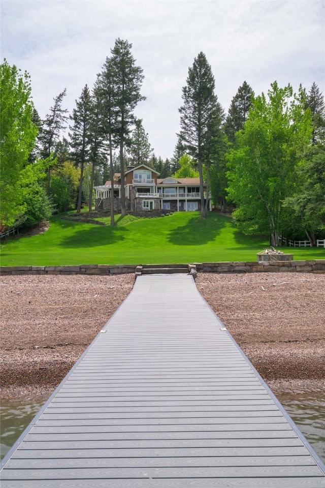 33702 N Finley Point Rd, Polson, MT 59860 - dock featuring a yard and a water view
